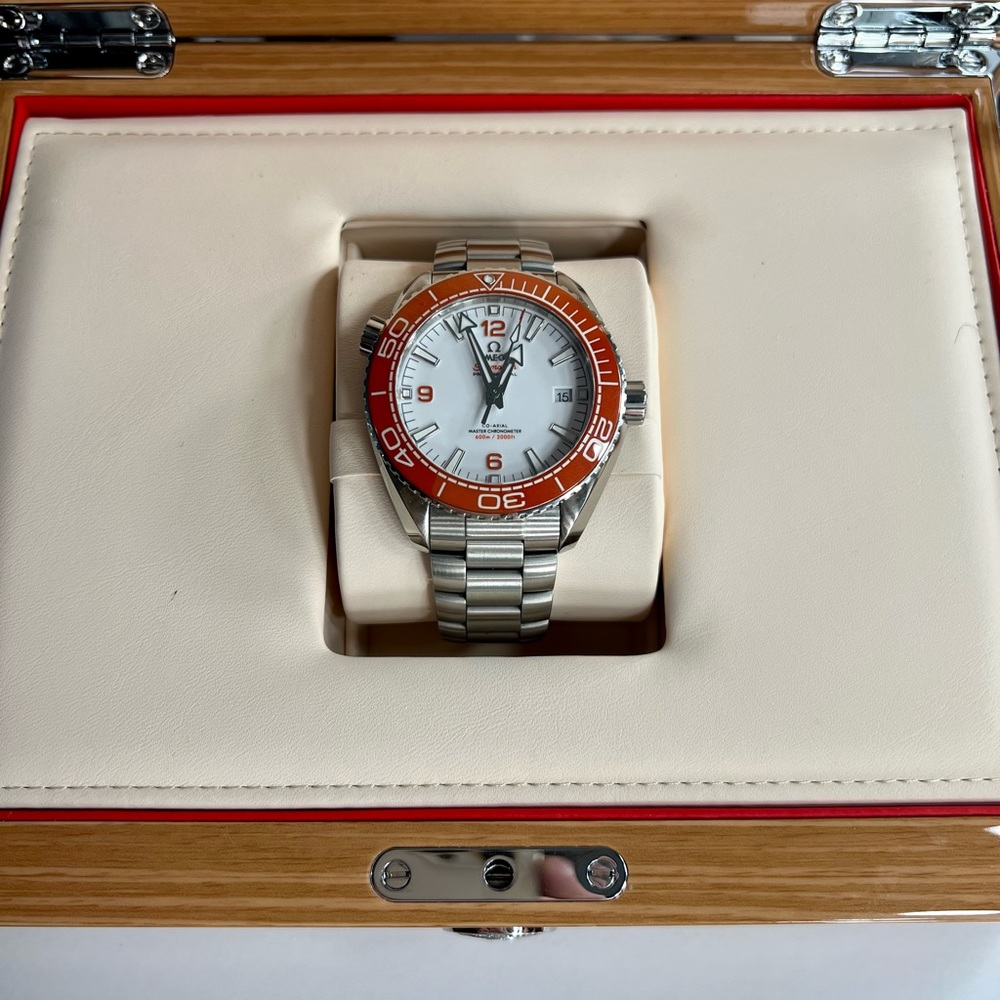 2021 Omega Sea-master Planet Ocean with a orange quarts bezel!